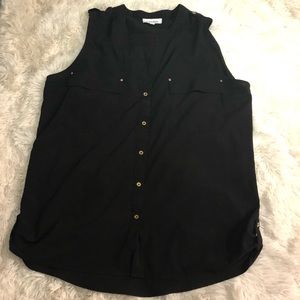 Short sleeve dressy top.